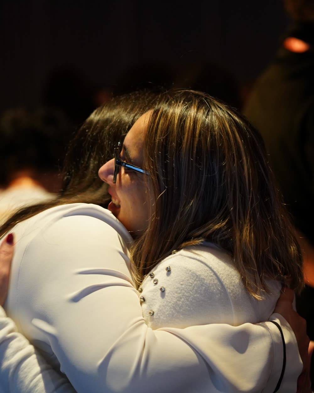 Abraço entre participantes do Fénix 2025